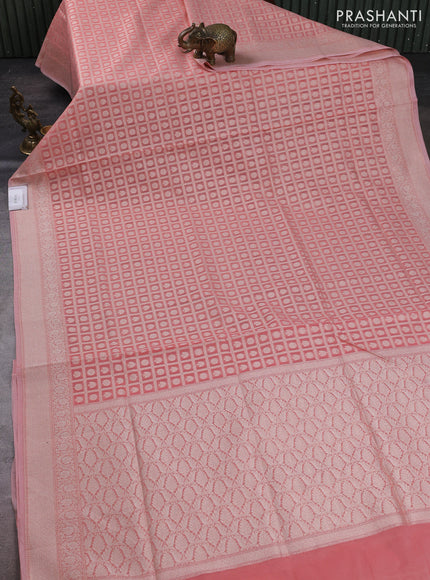 Banarasi silk cotton saree peach pink with allover thread & zari checks & buttas and thread & zari woven border