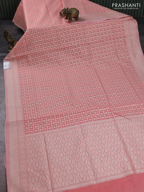 Banarasi silk cotton saree peach pink with allover thread & zari checks & buttas and thread & zari woven border
