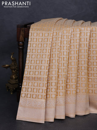 Banarasi silk cotton saree sandal with allover thread & zari checks & buttas and thread & zari woven border