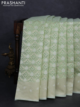 Banarasi silk cotton saree mild pista green with allover thread & zari woven brocade weaves and thread & zari woven border