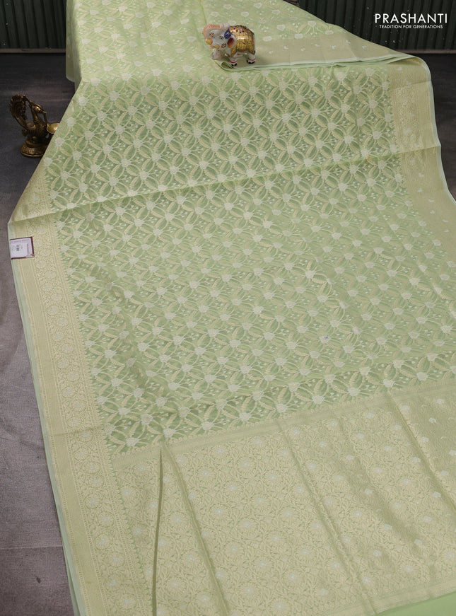 Banarasi silk cotton saree mild pista green with allover thread & zari woven brocade weaves and thread & zari woven border