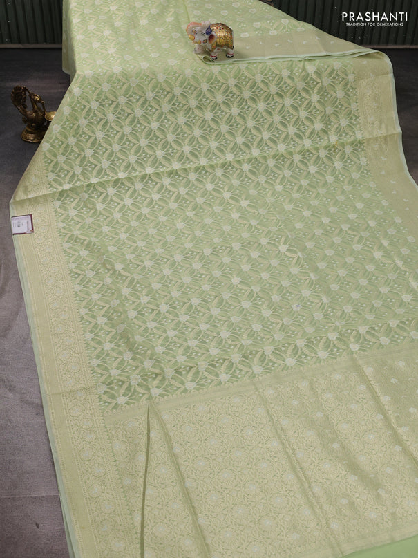 Banarasi silk cotton saree mild pista green with allover thread & zari woven brocade weaves and thread & zari woven border