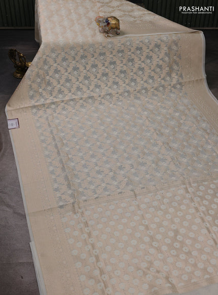 Banarasi silk cotton saree off white with allover thread & zari woven brocade weaves and thread & zari woven border