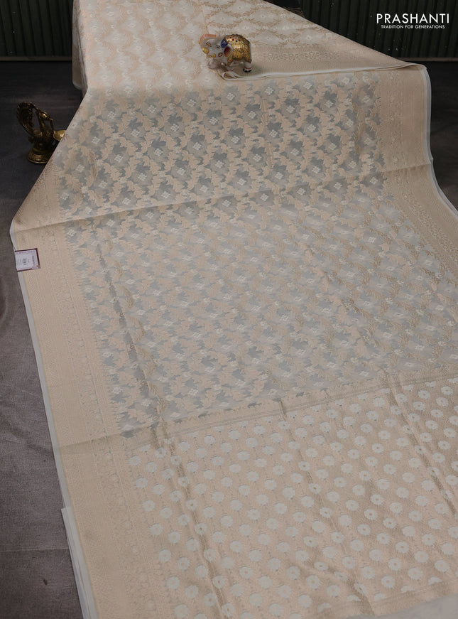 Banarasi silk cotton saree off white with allover thread & zari woven brocade weaves and thread & zari woven border