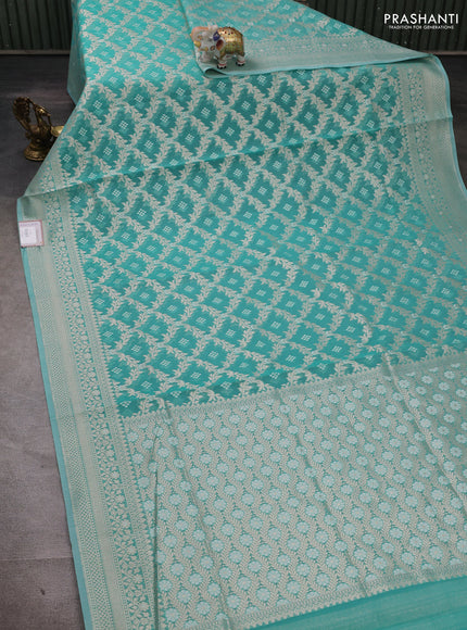 Banarasi silk cotton saree teal green with allover thread & zari woven brocade weaves and thread & zari woven border