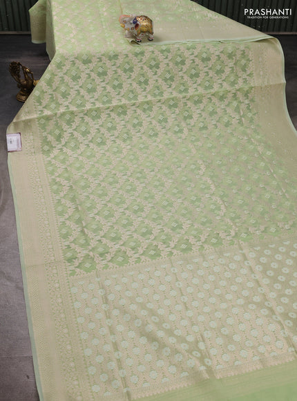 Banarasi silk cotton saree mild pista green with allover thread & zari woven brocade weaves and thread & zari woven border