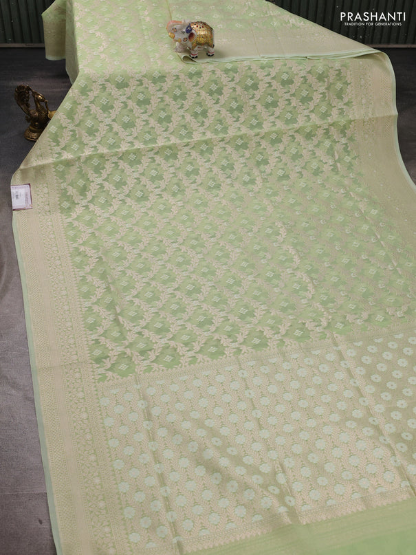Banarasi silk cotton saree mild pista green with allover thread & zari woven brocade weaves and thread & zari woven border