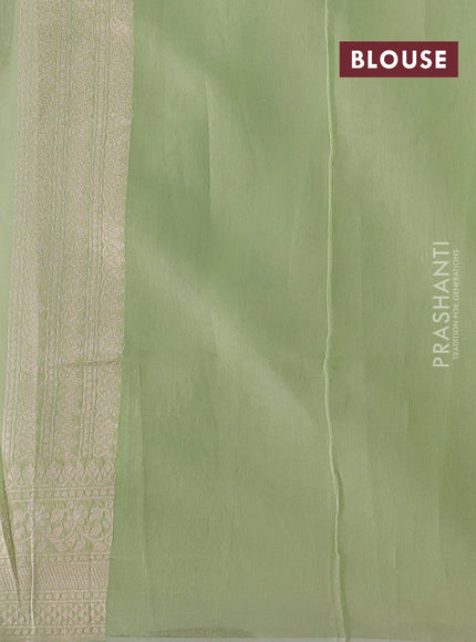 Banarasi silk cotton saree mild pista green with allover thread & zari woven brocade weaves and thread & zari woven border