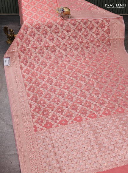 Banarasi silk cotton saree peach shade with allover thread & zari woven brocade weaves and thread & zari woven border