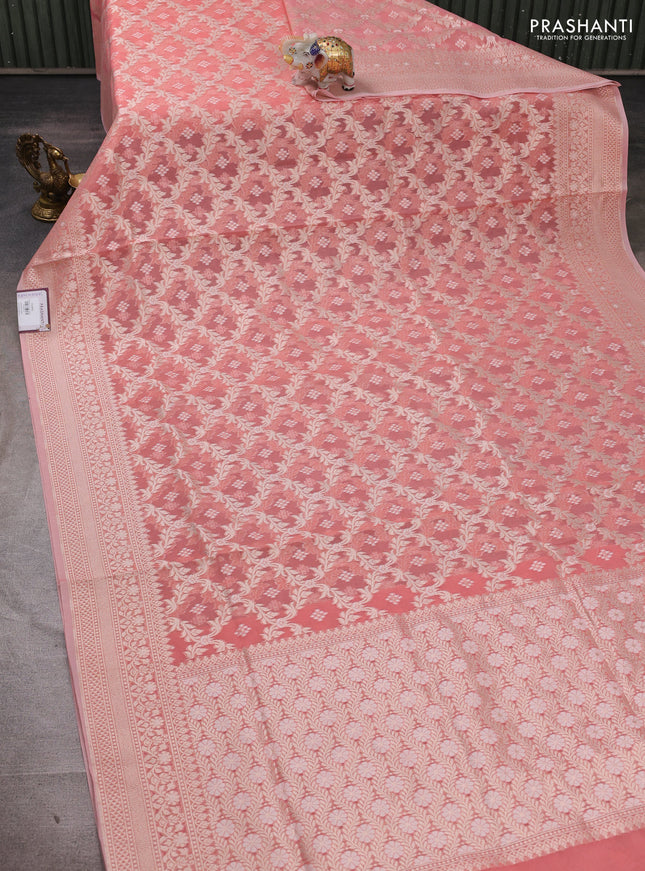 Banarasi silk cotton saree peach shade with allover thread & zari woven brocade weaves and thread & zari woven border