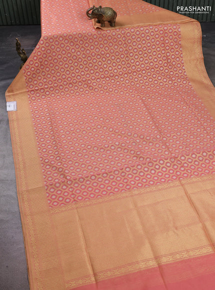 Banarasi silk cotton saree peach shade with allover silver & gold zari brocade weaves and zari woven border