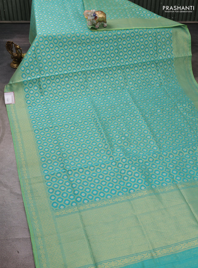 Banarasi silk cotton saree teal green with allover silver & gold zari brocade weaves and zari woven border