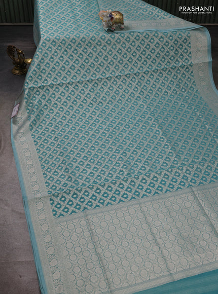 Banarasi silk cotton saree teal blue with allover thread & zari woven brocade weaves and thread & zari woven border