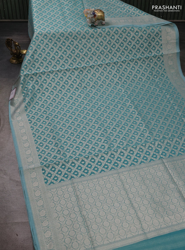 Banarasi silk cotton saree teal blue with allover thread & zari woven brocade weaves and thread & zari woven border