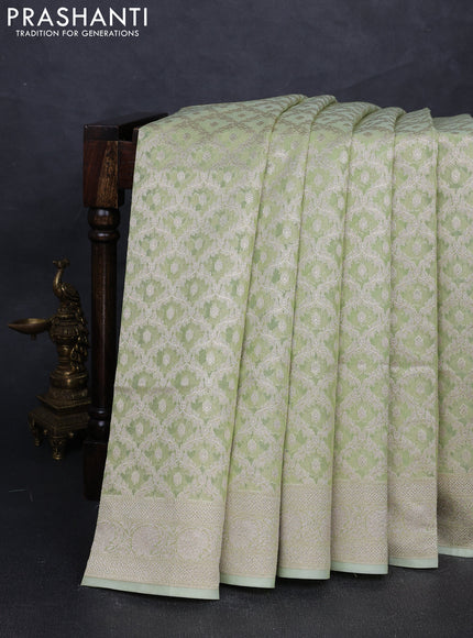 Banarasi silk cotton saree pista green with allover thread & zari woven brocade weaves and thread & zari woven border