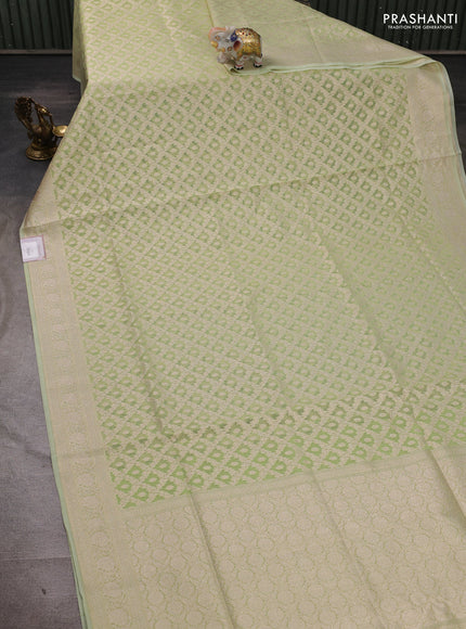 Banarasi silk cotton saree pista green with allover thread & zari woven brocade weaves and thread & zari woven border