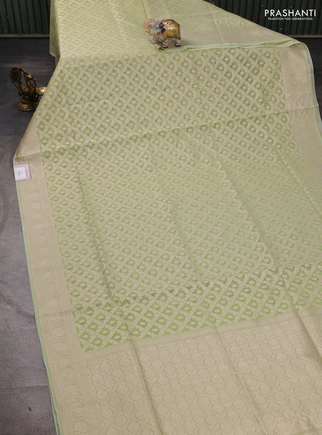 Banarasi silk cotton saree pista green with allover thread & zari woven brocade weaves and thread & zari woven border