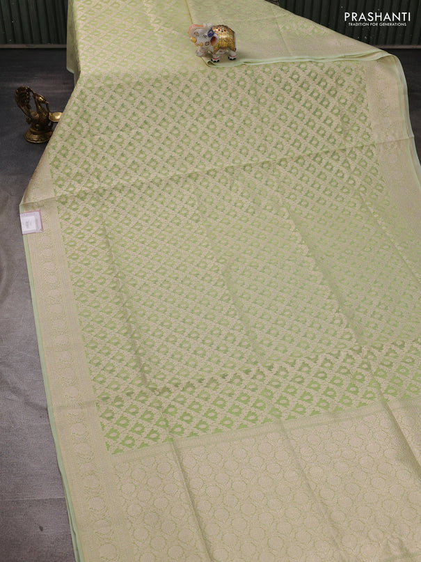 Banarasi silk cotton saree pista green with allover thread & zari woven brocade weaves and thread & zari woven border