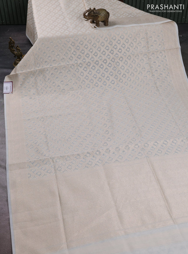 Banarasi silk cotton saree off white with allover thread & zari woven brocade weaves and thread & zari woven border