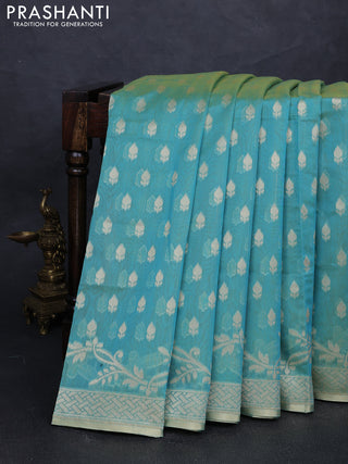 Banarasi silk cotton saree dual shade of teal green with allover thread & zari woven buttas and thread & zari woven border
