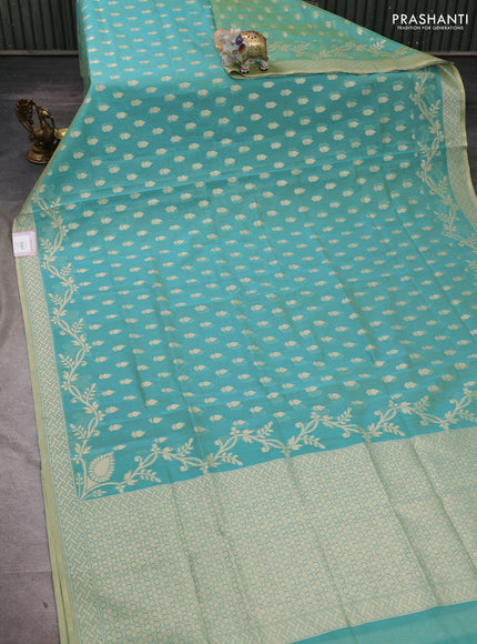 Banarasi silk cotton saree dual shade of teal green with allover thread & zari woven buttas and thread & zari woven border