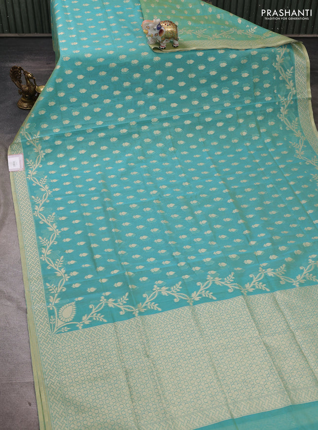 Banarasi silk cotton saree dual shade of teal green with allover thread & zari woven buttas and thread & zari woven border