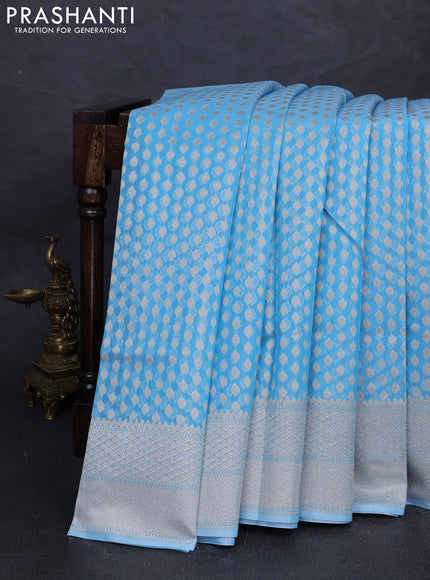 Banarasi silk cotton saree light blue with allover thread & zari woven buttas and thread & zari woven border