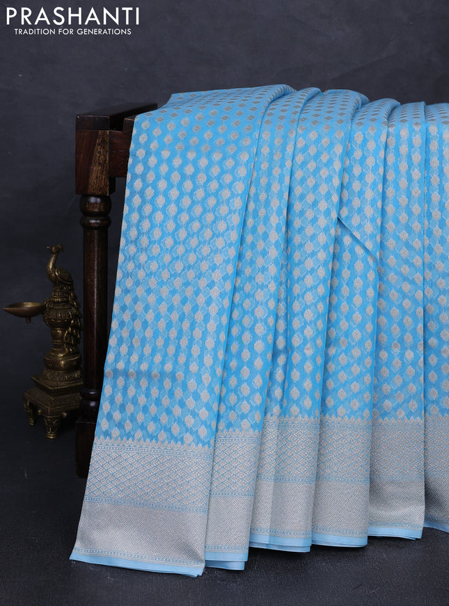 Banarasi silk cotton saree light blue with allover thread & zari woven buttas and thread & zari woven border
