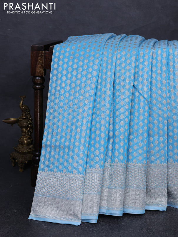 Banarasi silk cotton saree light blue with allover thread & zari woven buttas and thread & zari woven border