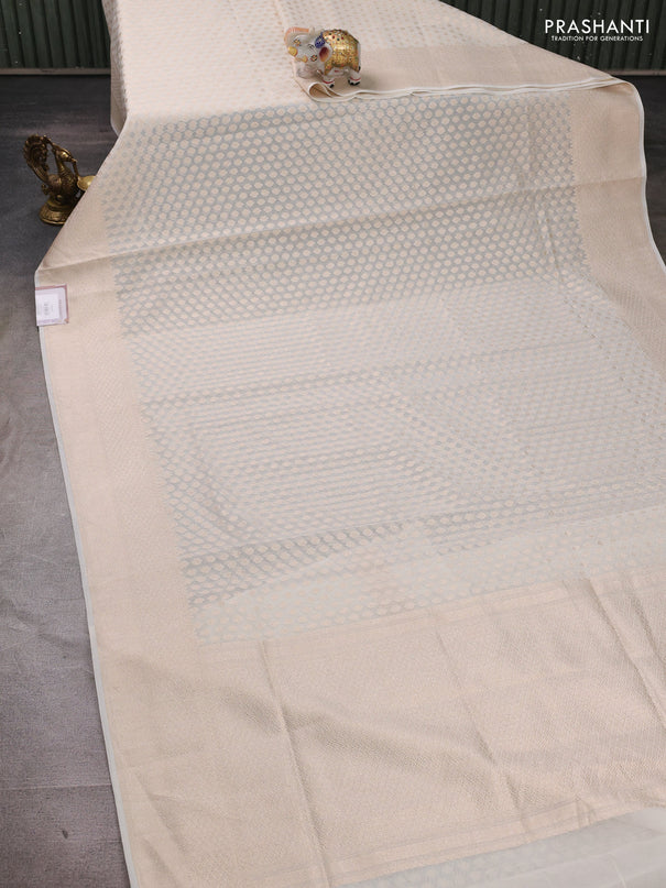 Banarasi silk cotton saree off white with allover thread & zari woven buttas and thread & zari woven border