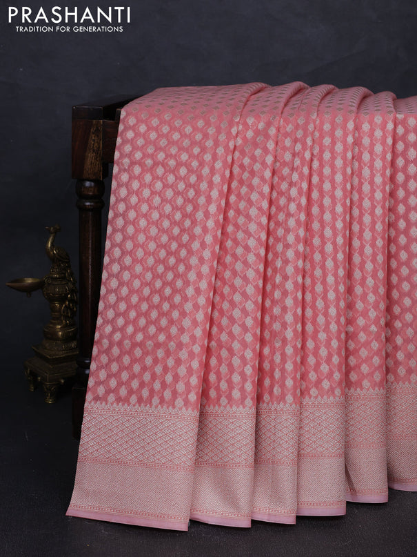 Banarasi silk cotton saree peach shade with allover thread & zari woven buttas and thread & zari woven border
