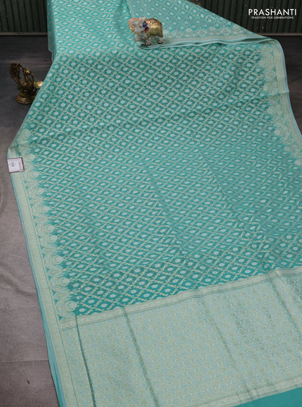 Banarasi silk cotton saree teal blue with allover thread & zari woven brocade weaves and thread & zari woven border