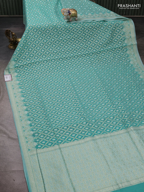 Banarasi silk cotton saree teal blue with allover thread & zari woven brocade weaves and thread & zari woven border