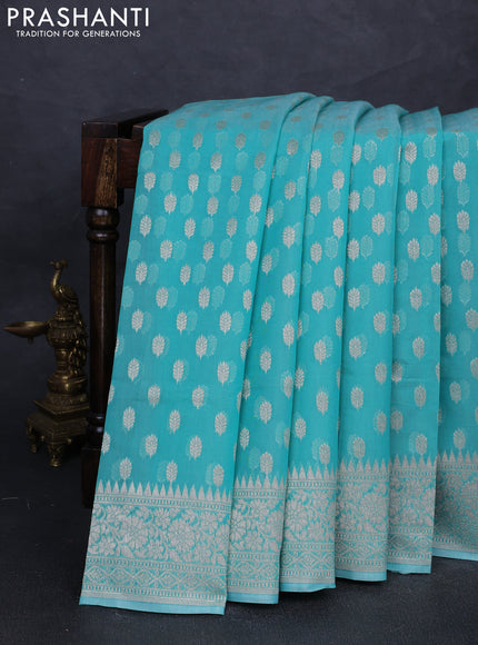 Banarasi silk cotton saree teal blue with allover thread & zari woven buttas and thread & zari woven border