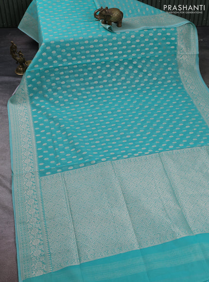 Banarasi silk cotton saree teal blue with allover thread & zari woven buttas and thread & zari woven border