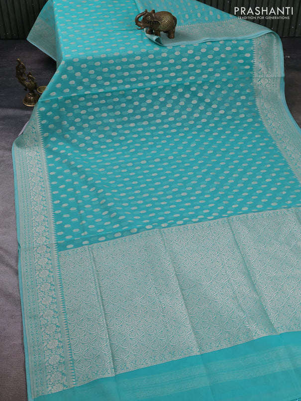 Banarasi silk cotton saree teal blue with allover thread & zari woven buttas and thread & zari woven border