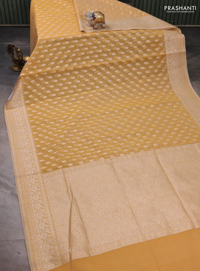 Banarasi silk cotton saree sandal with allover thread & zari woven buttas and thread & zari woven border