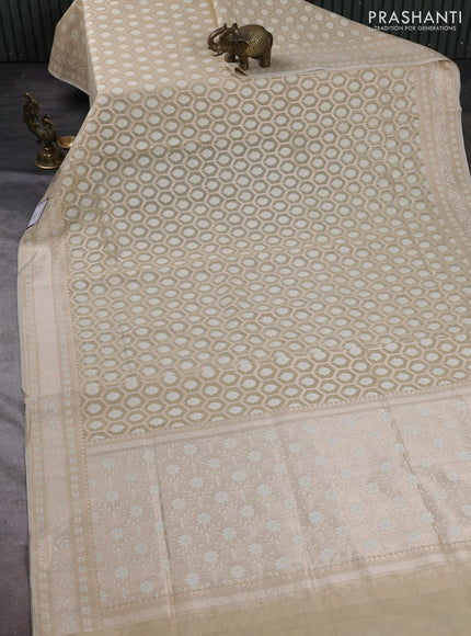 Banarasi silk cotton saree beige with allover thread & zari woven brocade weaves and thread & zari woven border