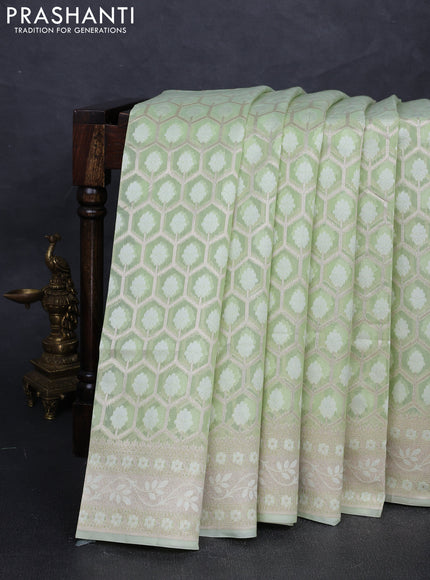 Banarasi silk cotton saree mild pista green with allover thread & zari woven brocade weaves and thread & zari woven border