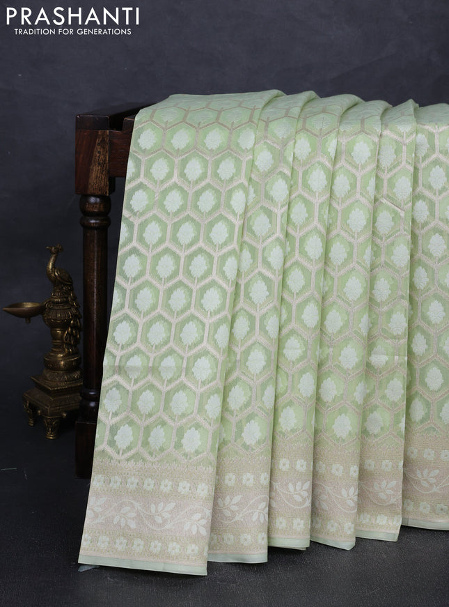 Banarasi silk cotton saree mild pista green with allover thread & zari woven brocade weaves and thread & zari woven border