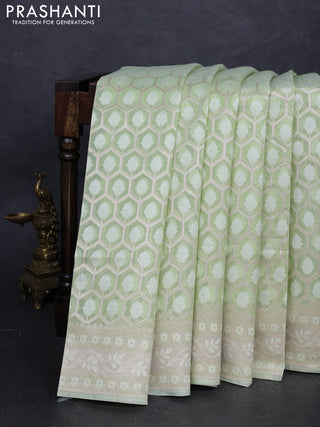 Banarasi silk cotton saree mild pista green with allover thread & zari woven brocade weaves and thread & zari woven border