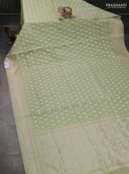 Banarasi silk cotton saree mild pista green with allover thread & zari woven brocade weaves and thread & zari woven border