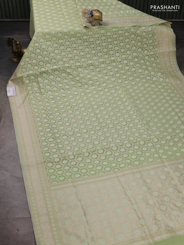 Banarasi silk cotton saree mild pista green with allover thread & zari woven brocade weaves and thread & zari woven border