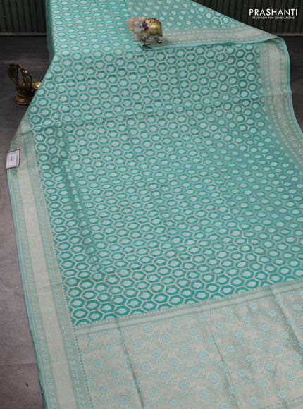 Banarasi silk cotton saree teal green with allover thread & zari woven brocade weaves and thread & zari woven border