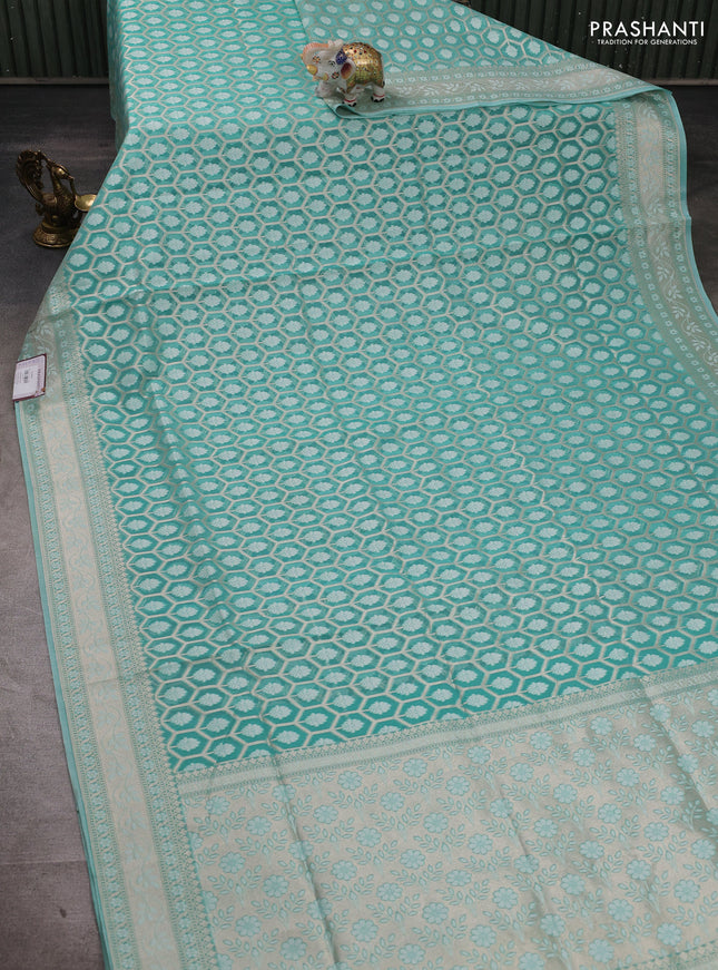 Banarasi silk cotton saree teal green with allover thread & zari woven brocade weaves and thread & zari woven border