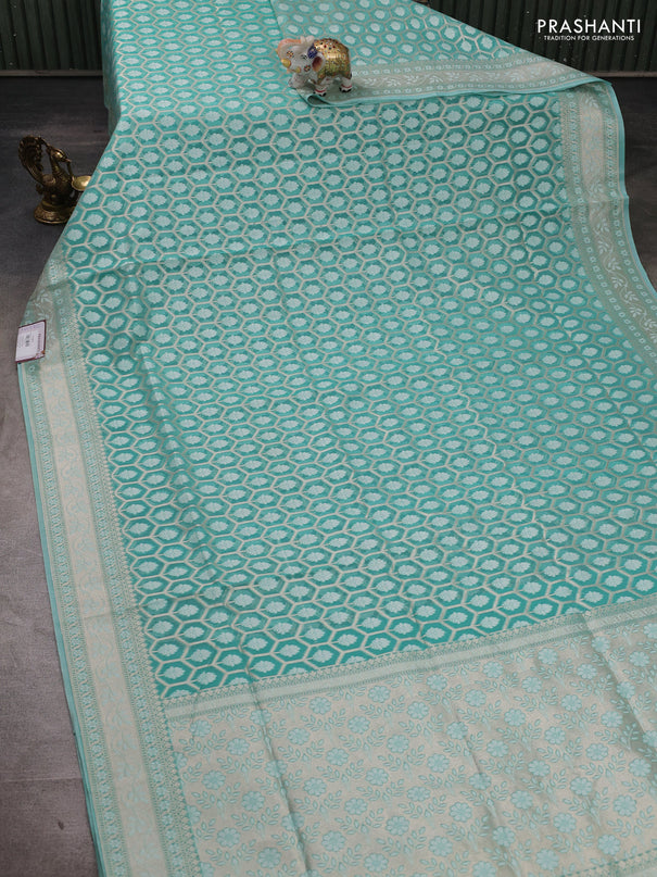 Banarasi silk cotton saree teal green with allover thread & zari woven brocade weaves and thread & zari woven border