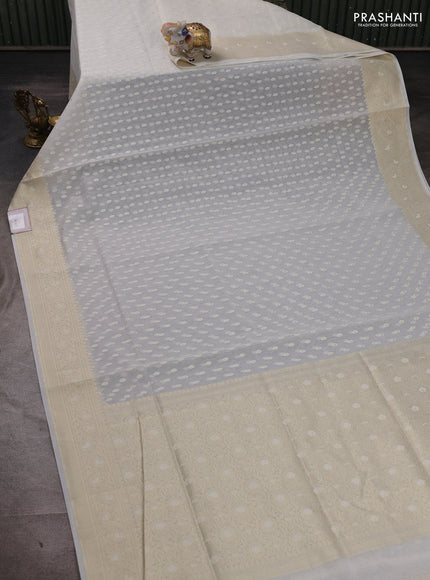Banarasi silk cotton saree off white with allover thread & zari woven buttas and thread & zari woven border