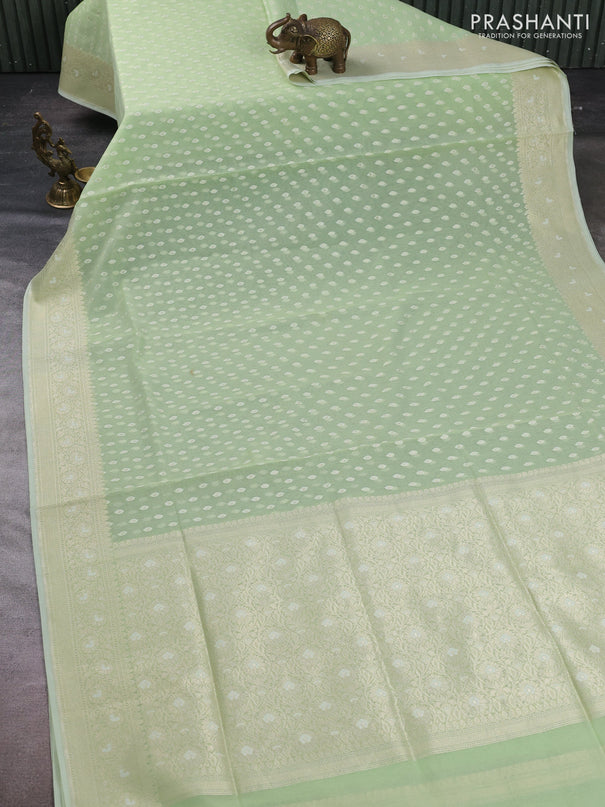 Banarasi silk cotton saree mild pista green with allover thread & zari woven buttas and thread & zari woven border