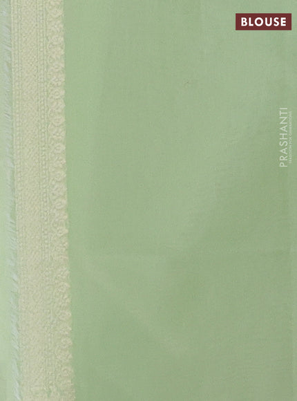 Banarasi silk cotton saree mild pista green with allover thread & zari woven buttas and thread & zari woven border