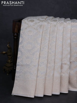 Banarasi silk cotton saree off white with allover thread & zari woven brocade weaves and temple design thread & zari woven border